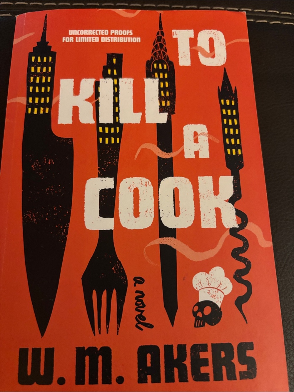 comedic mystery novel To Kill a Cook by W. M. Akers